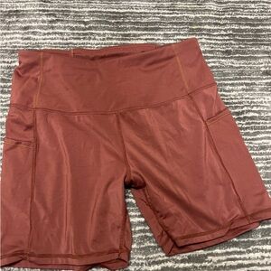 Brown biker shorts with pockets